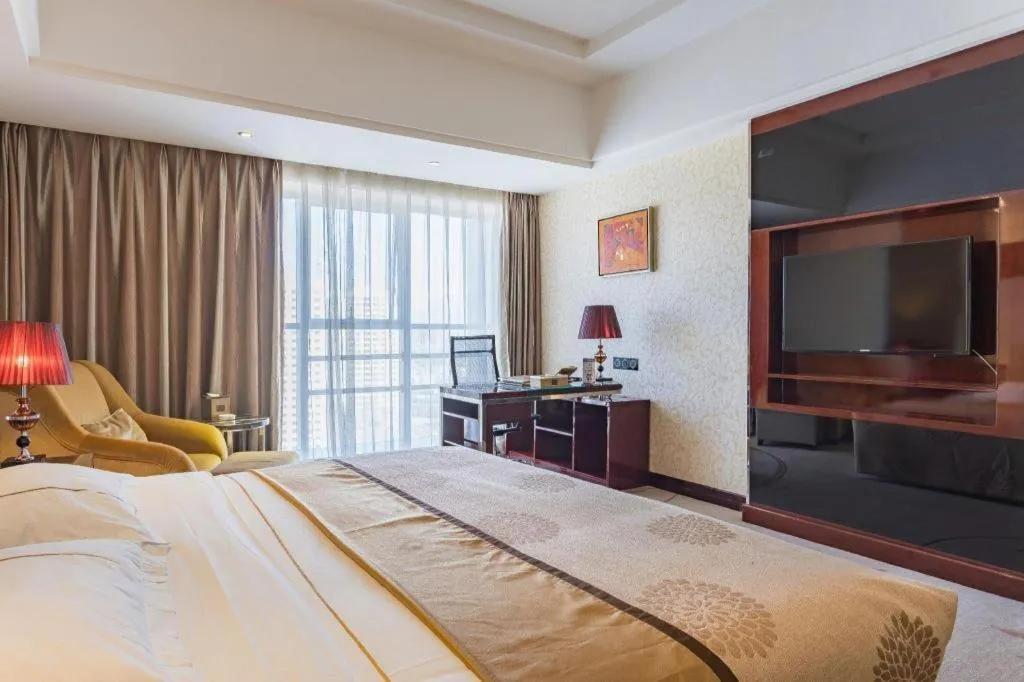 Bed in Xin Sheng Da Hong Sheng International Hotel