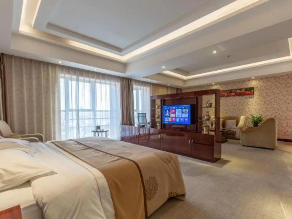 Bed in Xin Sheng Da Hong Sheng International Hotel