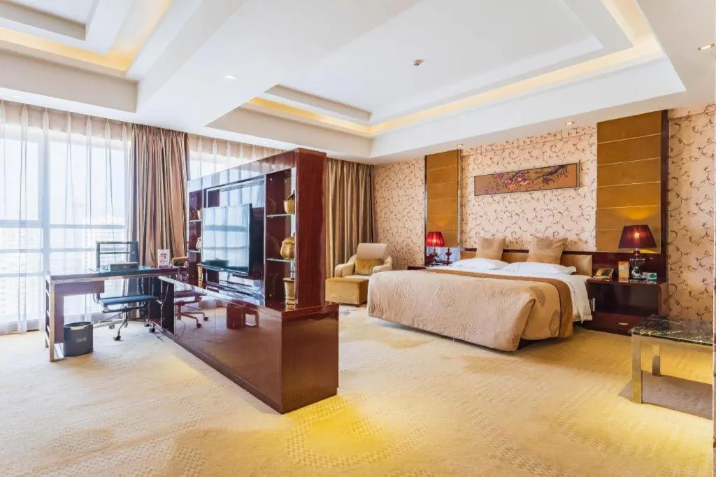 Bed in Xin Sheng Da Hong Sheng International Hotel