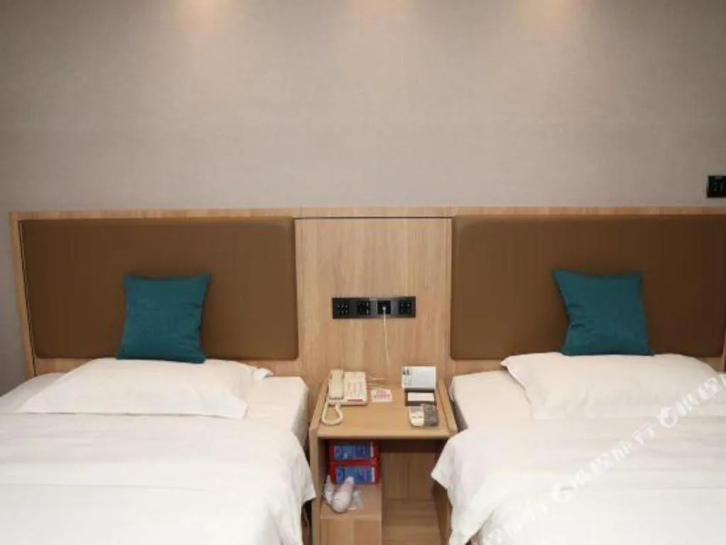 Bed in GreenTree Inn Beijing Shangdi East Anningzhuang Road Shell Hotel