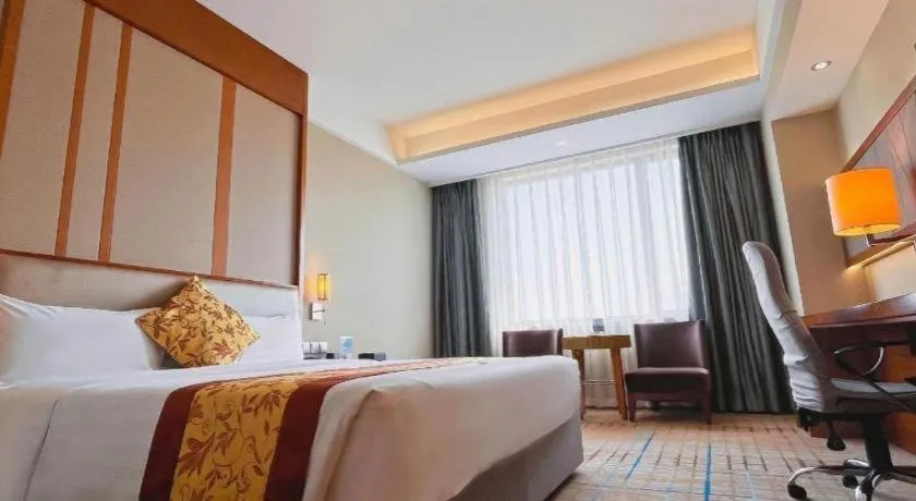 Bed in Shenyang Rayfont International Hotel