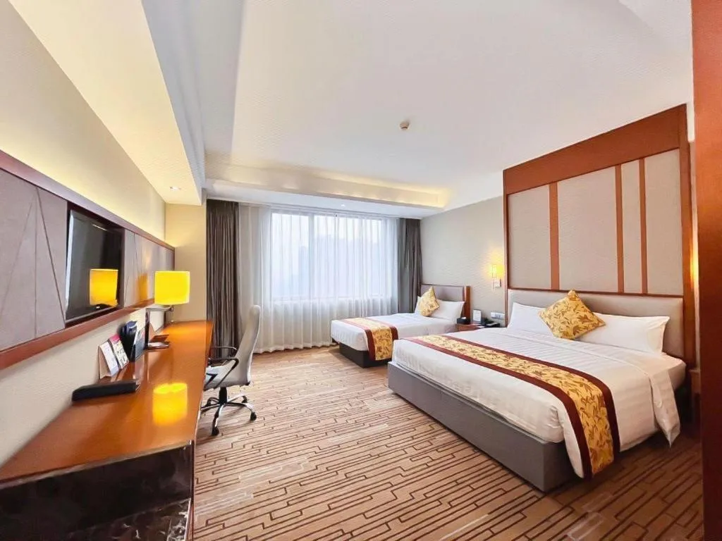 Bed in Shenyang Rayfont International Hotel