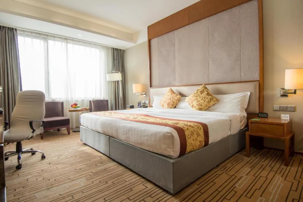 Bed in Shenyang Rayfont International Hotel