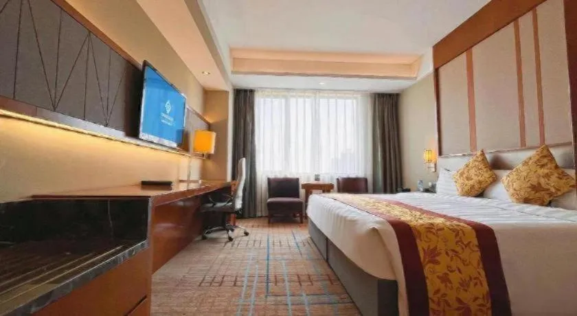 Bed in Shenyang Rayfont International Hotel