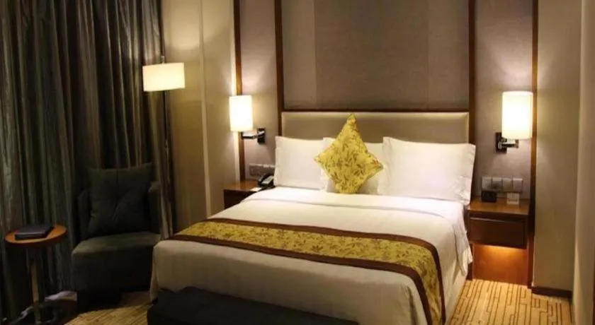 Bed in Shenyang Rayfont International Hotel