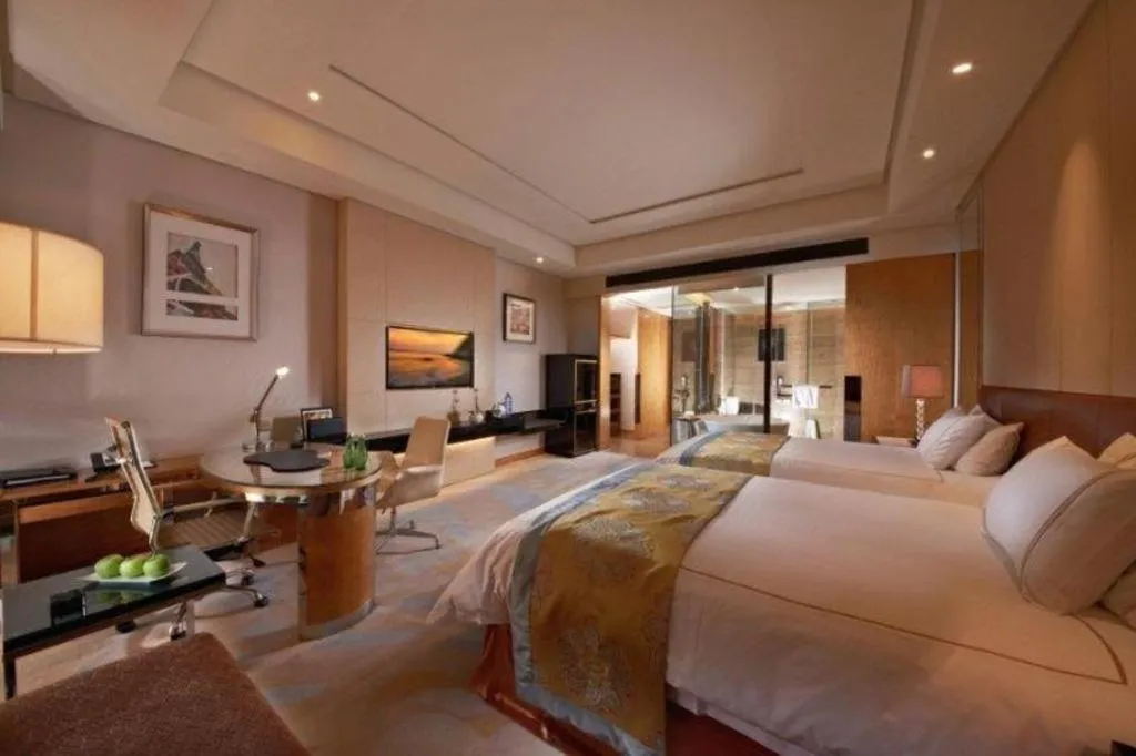 Bed in Grand Parkray Hangzhou Hotel