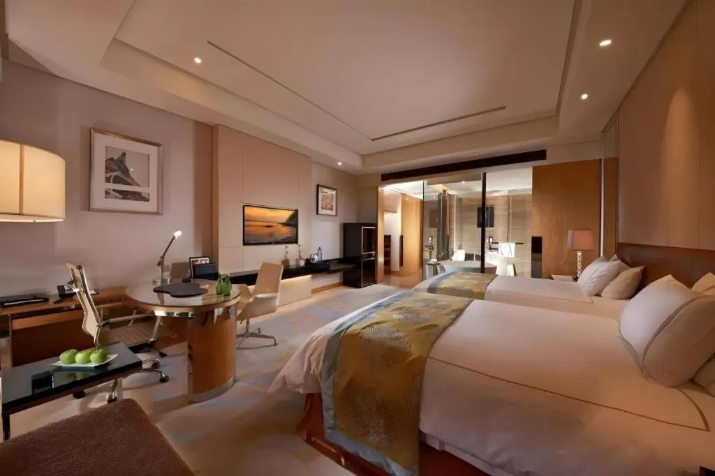 Bed in Grand Parkray Hangzhou Hotel