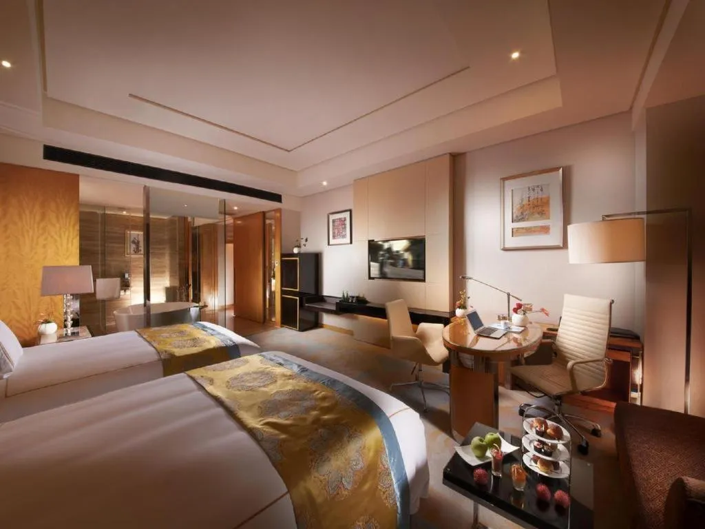 Bed in Grand Parkray Hangzhou Hotel