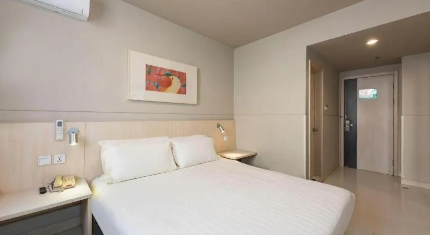 Bed in Jinjiang Inn Beijing Huairou Qingchun Road Wanda Plaza