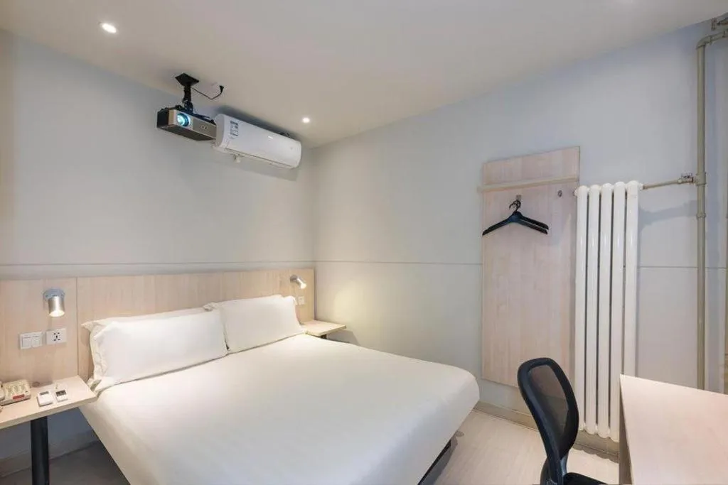 Bed in Jinjiang Inn Beijing Huairou Qingchun Road Wanda Plaza