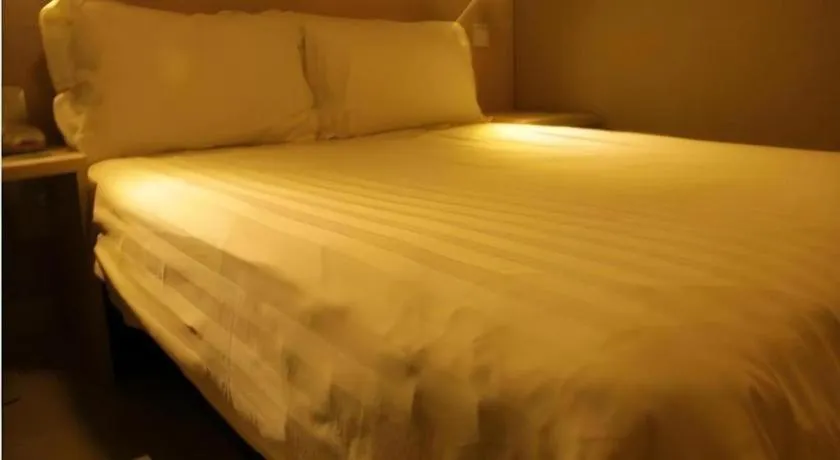 Bed in Jinjiang Inn Beijing Huairou Qingchun Road Wanda Plaza