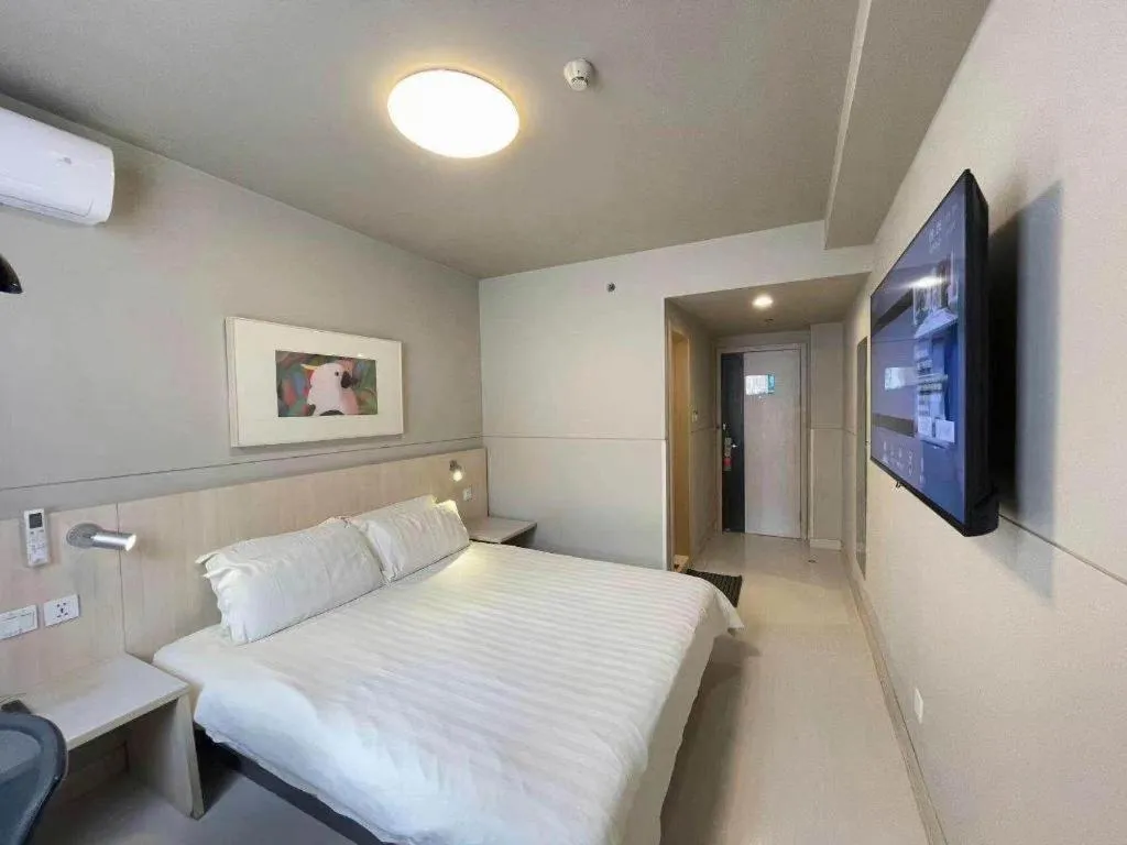Bed in Jinjiang Inn Beijing Huairou Qingchun Road Wanda Plaza
