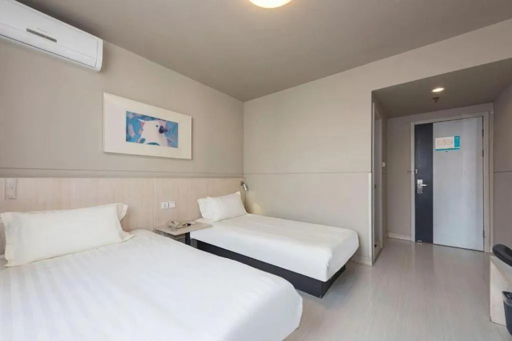 Bed in Jinjiang Inn Beijing Huairou Qingchun Road Wanda Plaza