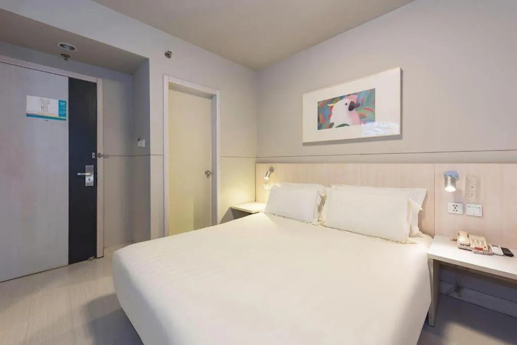 Bed in Jinjiang Inn Beijing Huairou Qingchun Road Wanda Plaza