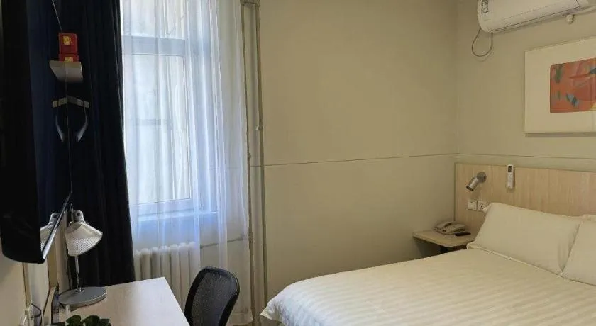 Bed in Jinjiang Inn Beijing Huairou Qingchun Road Wanda Plaza