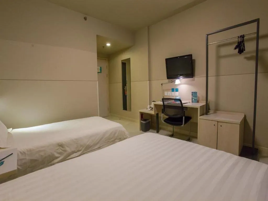 Bed in Jinjiang Inn Beijing Huairou Qingchun Road Wanda Plaza