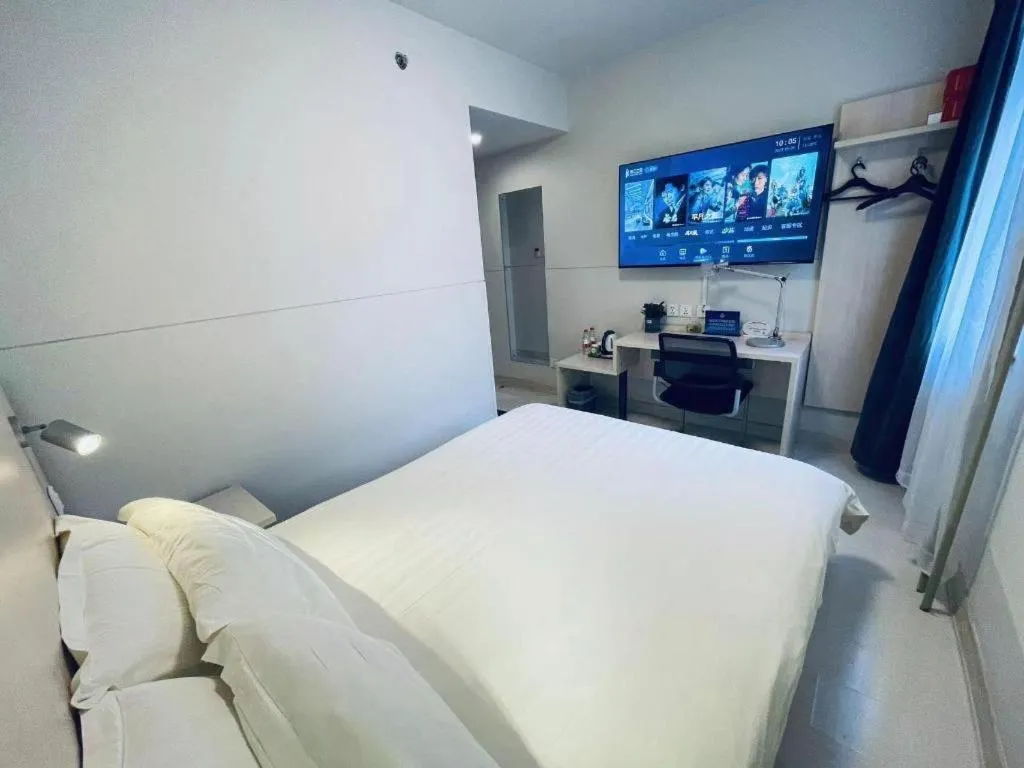 Bed in Jinjiang Inn Beijing Huairou Qingchun Road Wanda Plaza