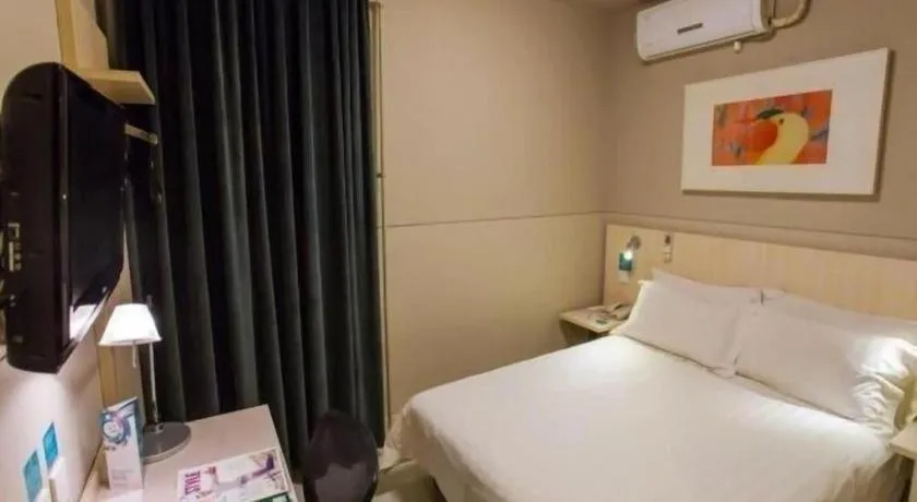 Bed in Jinjiang Inn Beijing Huairou Qingchun Road Wanda Plaza