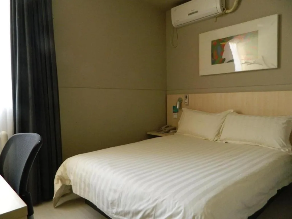 Bed in Jinjiang Inn Beijing Huairou Qingchun Road Wanda Plaza