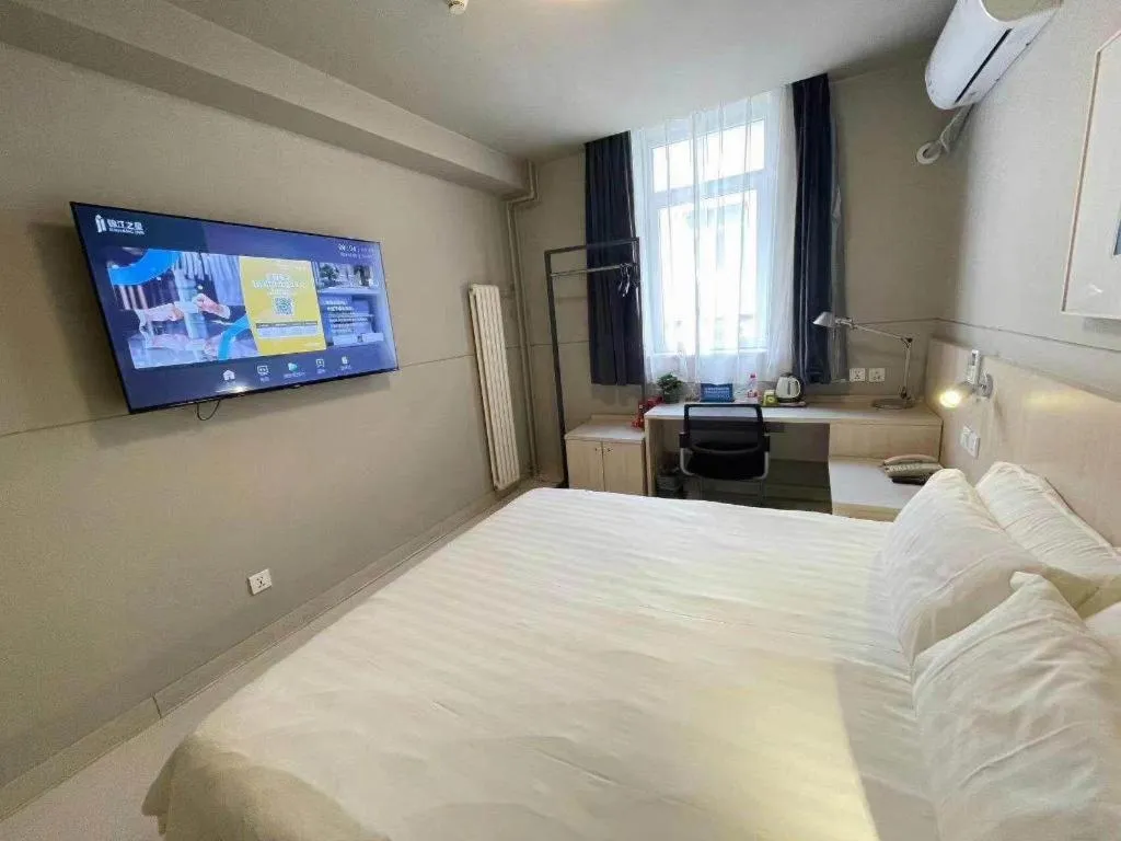 Bed in Jinjiang Inn Beijing Huairou Qingchun Road Wanda Plaza