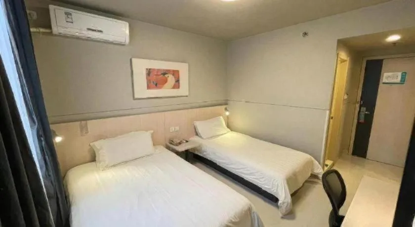Bed in Jinjiang Inn Beijing Huairou Qingchun Road Wanda Plaza