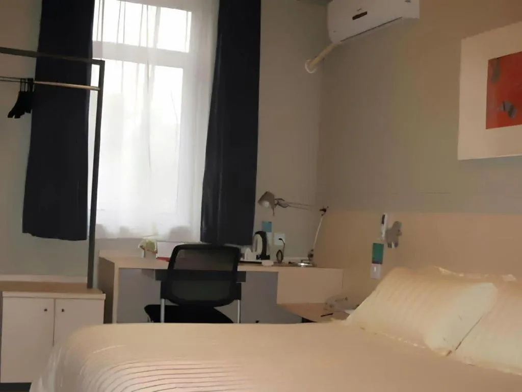 Bed in Jinjiang Inn Beijing Huairou Qingchun Road Wanda Plaza
