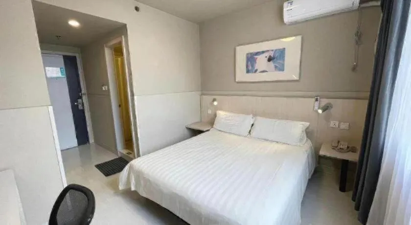 Bed in Jinjiang Inn Beijing Huairou Qingchun Road Wanda Plaza