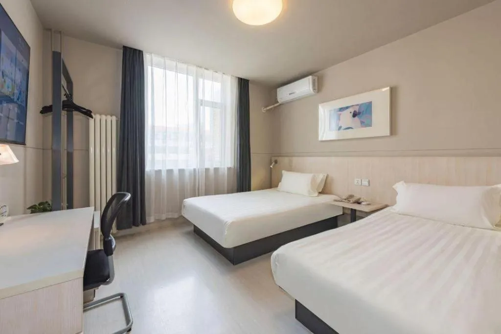 Bed in Jinjiang Inn Beijing Huairou Qingchun Road Wanda Plaza