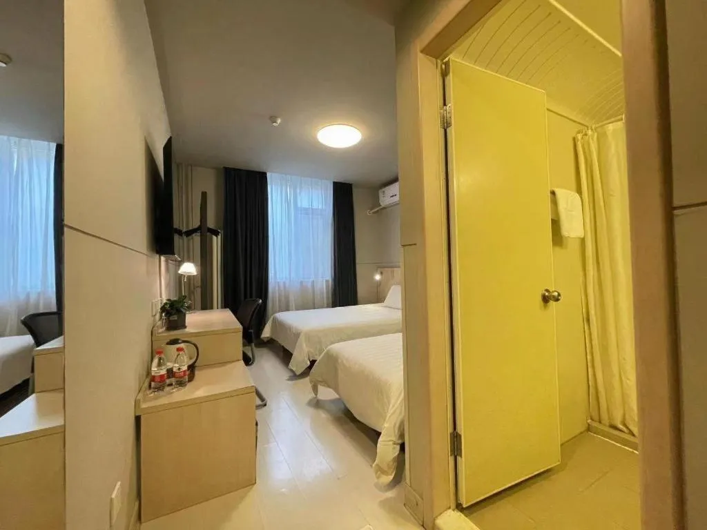 Bed in Jinjiang Inn Beijing Huairou Qingchun Road Wanda Plaza