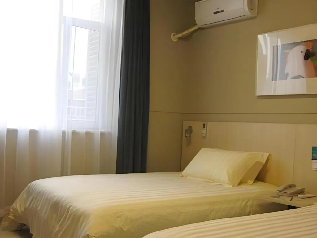 Bed in Jinjiang Inn Beijing Huairou Qingchun Road Wanda Plaza