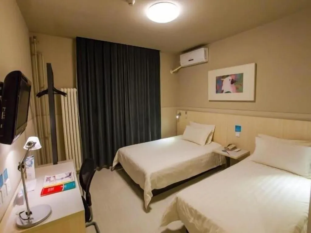 Bed in Jinjiang Inn Beijing Huairou Qingchun Road Wanda Plaza
