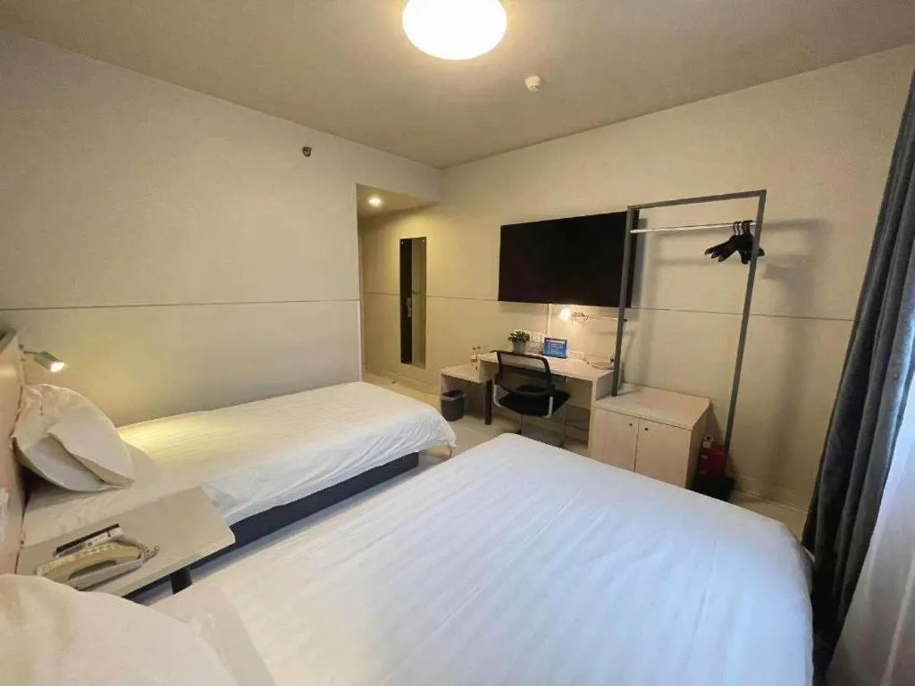 Bed in Jinjiang Inn Beijing Huairou Qingchun Road Wanda Plaza