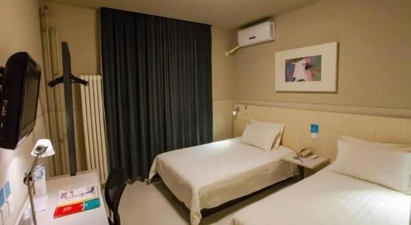Bed in Jinjiang Inn Beijing Huairou Qingchun Road Wanda Plaza