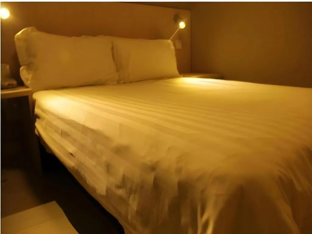 Bed in Jinjiang Inn Beijing Huairou Qingchun Road Wanda Plaza