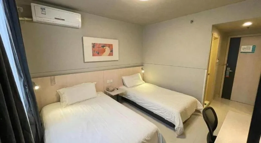 Bed in Jinjiang Inn Beijing Huairou Qingchun Road Wanda Plaza