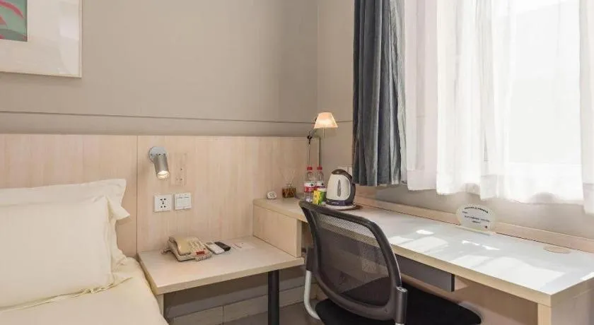 Bed in Jinjiang Inn Beijing Huairou Qingchun Road Wanda Plaza