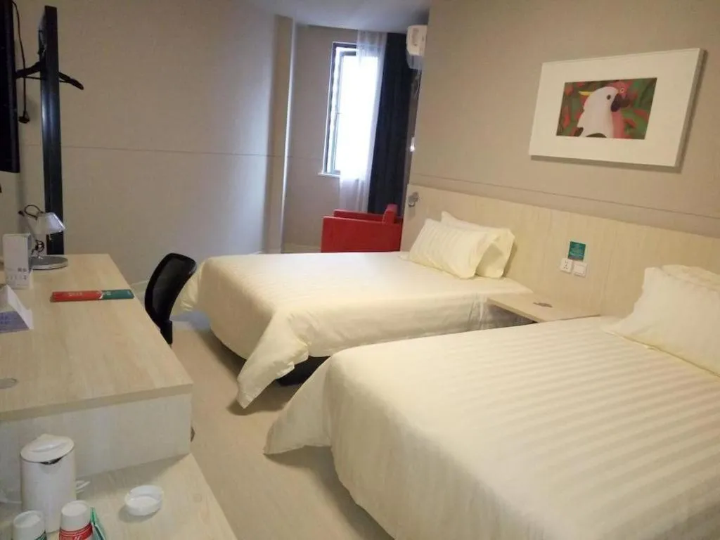 Bed in Jinjiang Inn Beijing Huairou Qingchun Road Wanda Plaza
