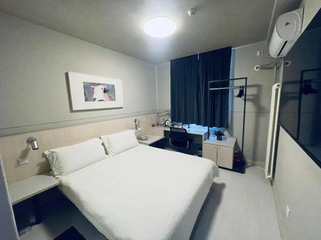 Bed in Jinjiang Inn Beijing Huairou Qingchun Road Wanda Plaza