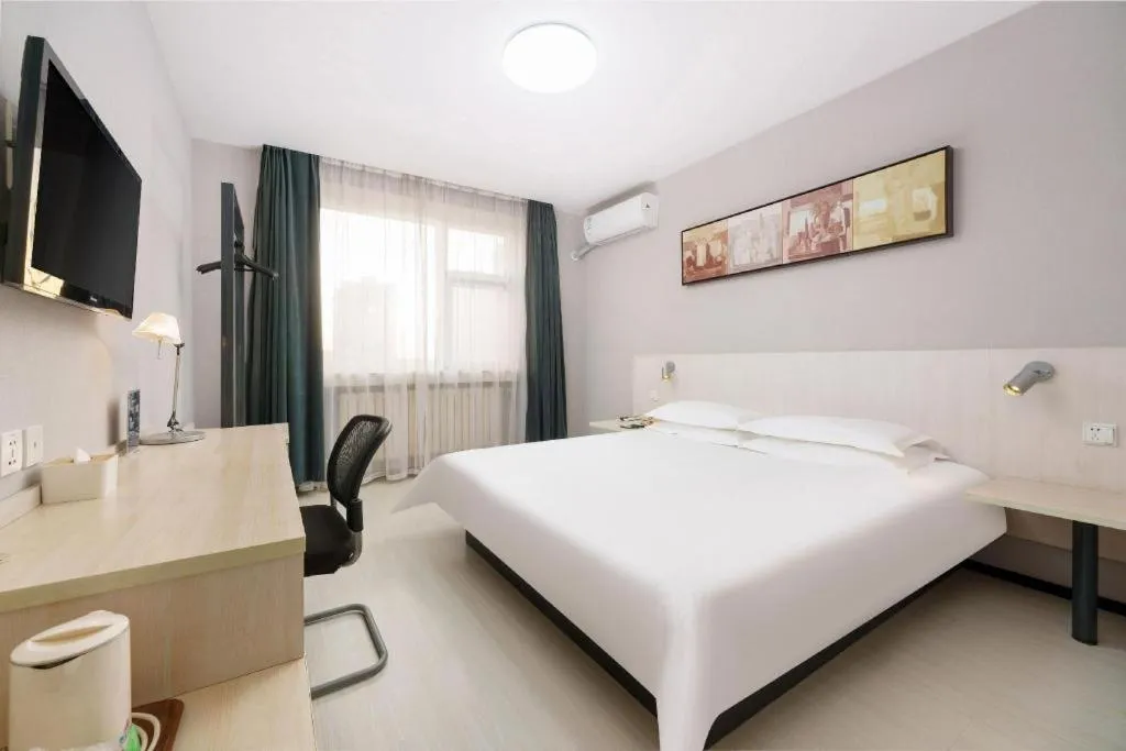 Bed in Jinjiang Inn Dalian Development Zone Jinma Road Light Railway Station