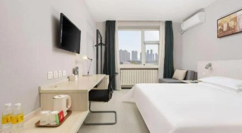 Bed in Jinjiang Inn Dalian Development Zone Jinma Road Light Railway Station