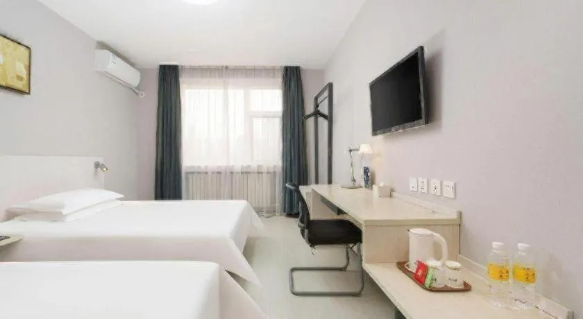 Bed in Jinjiang Inn Dalian Development Zone Jinma Road Light Railway Station