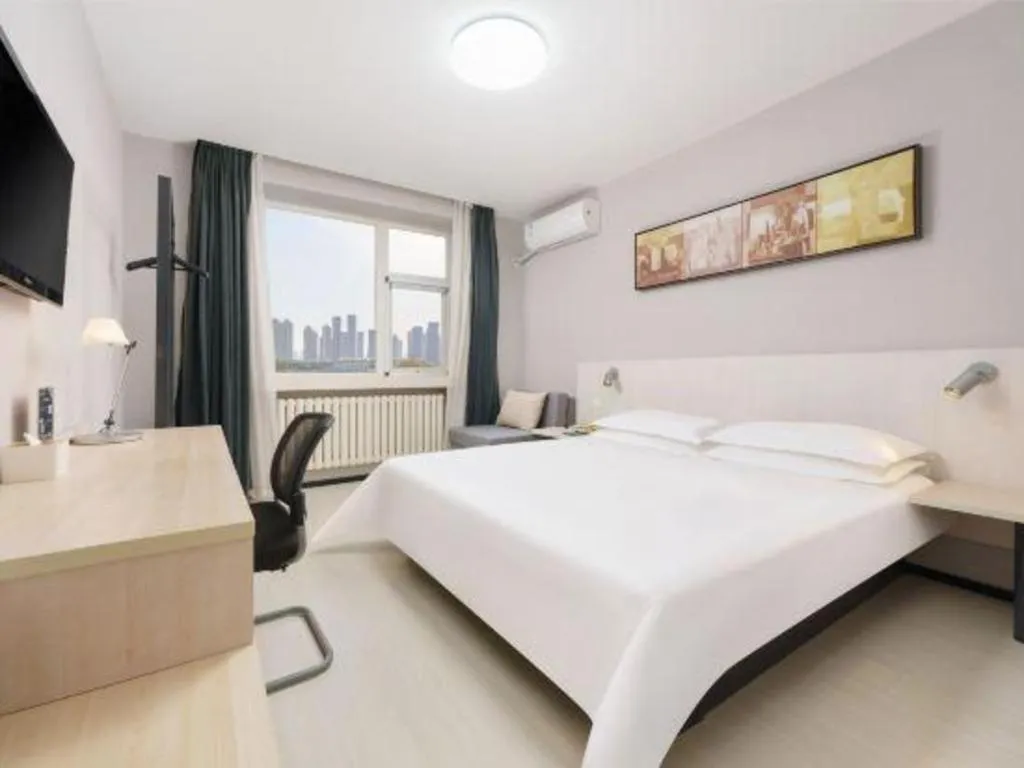 Bed in Jinjiang Inn Dalian Development Zone Jinma Road Light Railway Station