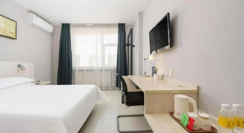 Bed in Jinjiang Inn Dalian Development Zone Jinma Road Light Railway Station