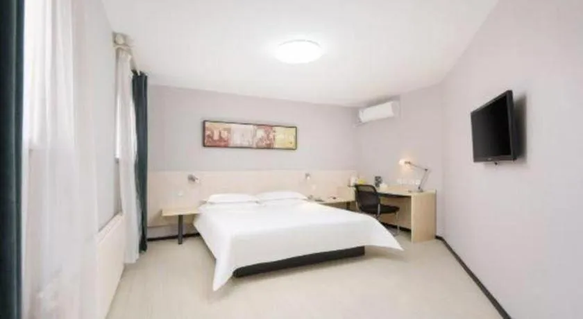 Bed in Jinjiang Inn Dalian Development Zone Jinma Road Light Railway Station