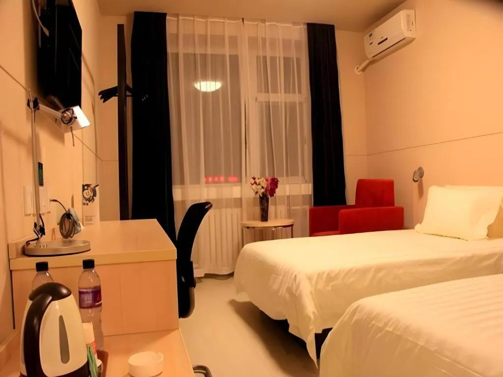 Bed in Jinjiang Inn Dalian Development Zone Jinma Road Light Railway Station