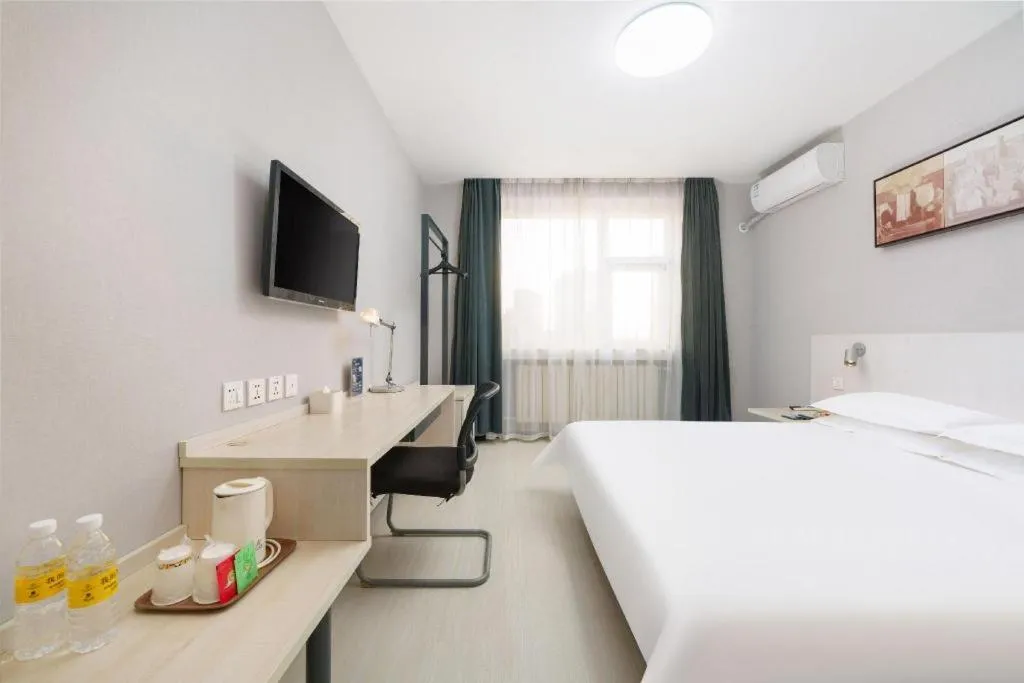 Bed in Jinjiang Inn Dalian Development Zone Jinma Road Light Railway Station