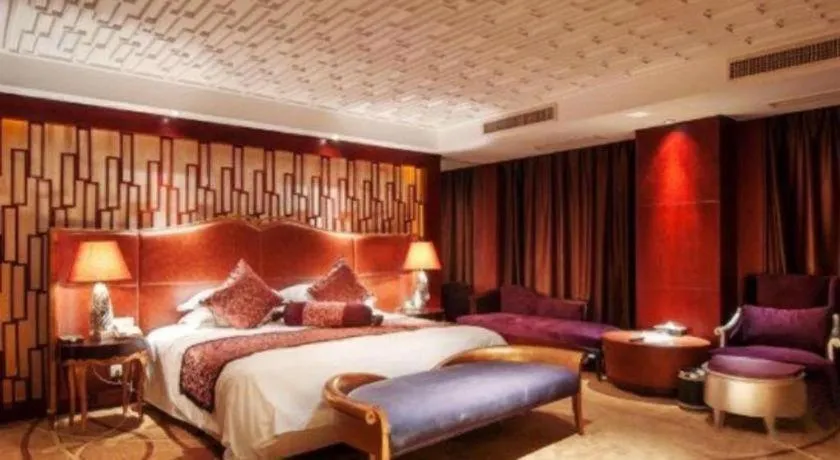 Bed in Maison New Century Hotel Wuyuan Haiyan