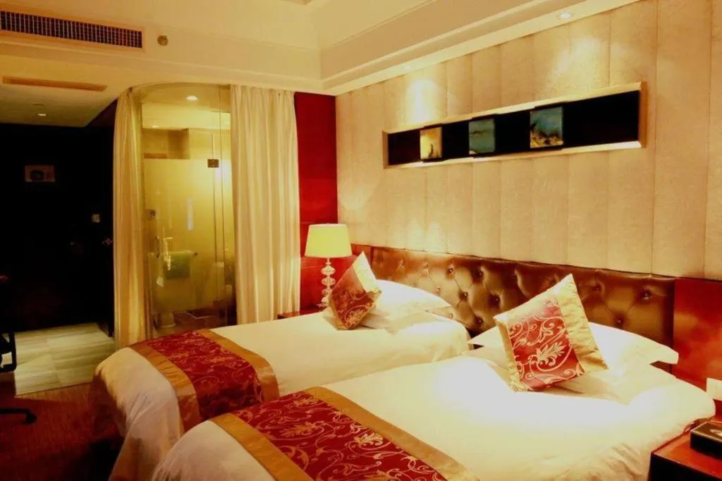 Bed in Maison New Century Hotel Wuyuan Haiyan