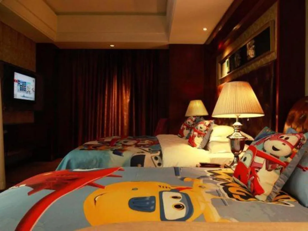 Bed in Maison New Century Hotel Wuyuan Haiyan