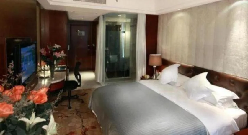 Bed in Maison New Century Hotel Wuyuan Haiyan